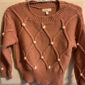 GB girls Pink Crewneck Sweater with Diamond Pattern and Pom-Poms